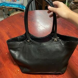 Black leather coach handbag